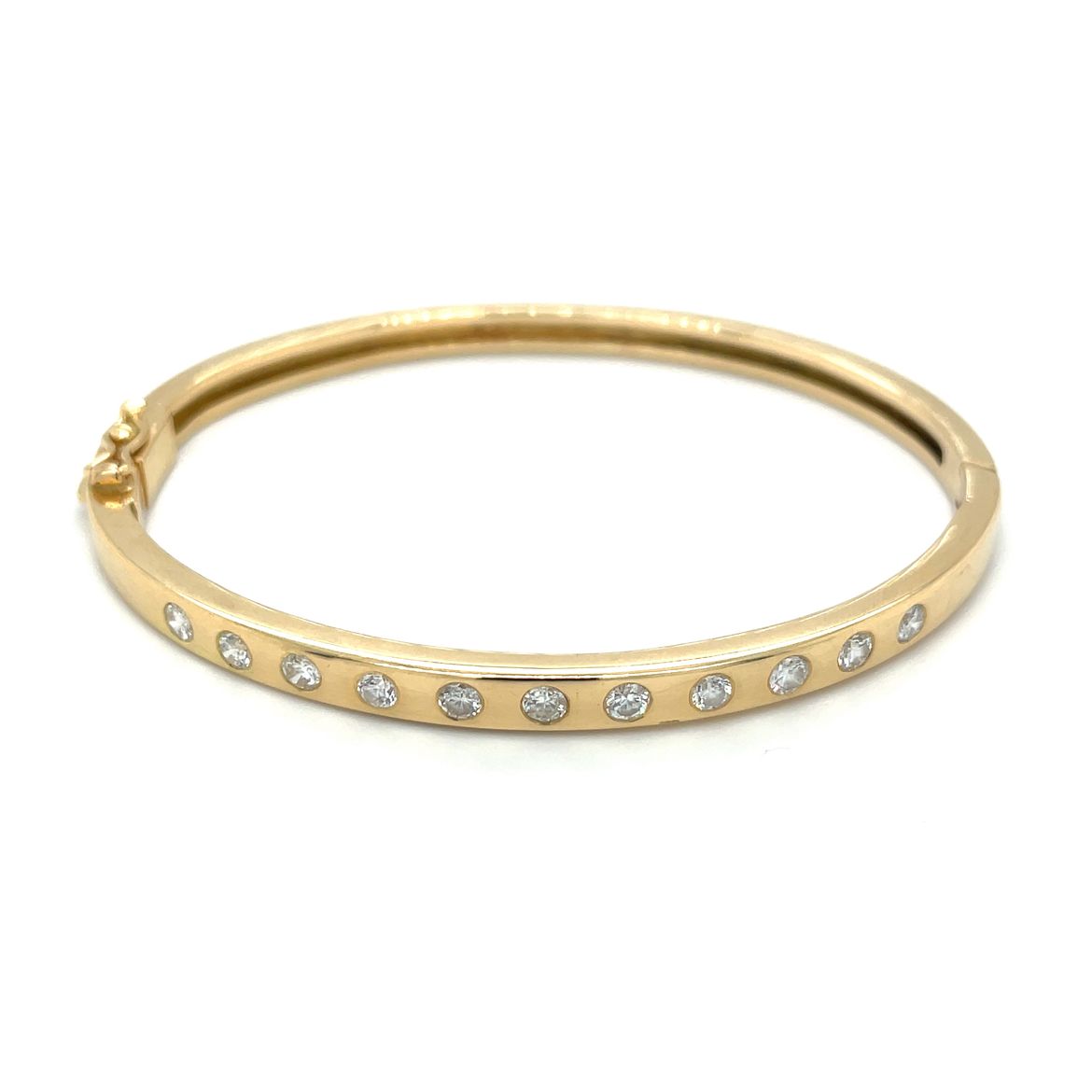 18ct yellow gold hinged bangle with 11 flush set diamonds and a figure of 8 safety catch