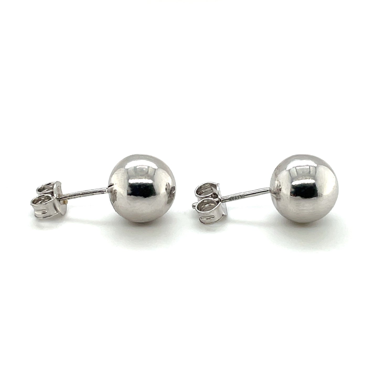 An elegant pair of 'echo' oval drop earrings, crafted in silver. These drop earrings are secured with a post and butterfly scroll back for a comfortable wearing experience.