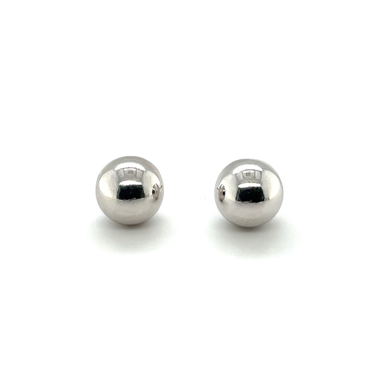 An elegant pair of 'echo' oval drop earrings, crafted in silver. These drop earrings are secured with a post and butterfly scroll back for a comfortable wearing experience.