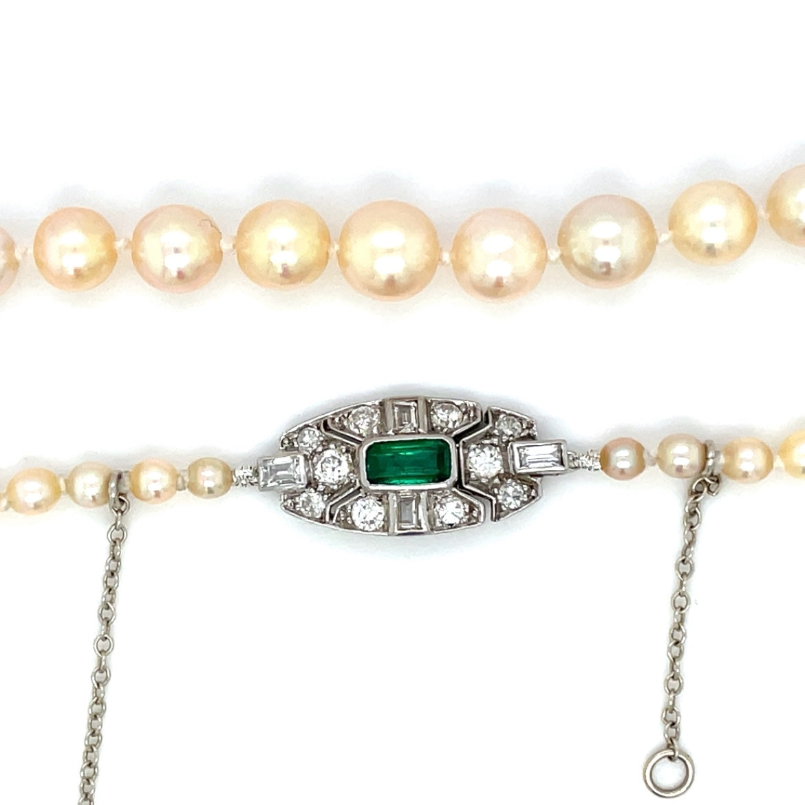 18inch cultured pearl necklace (graduating from 2.7mm - 7mm) with an 18ct white gold clasp set with an emeraldf cut emerald and bauguette and round diamonds.