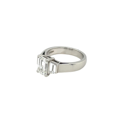 Platinum Emerald-Cut Diamond Three Stone Ring (K)