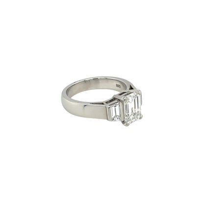 Platinum Emerald-Cut Diamond Three Stone Ring (K)