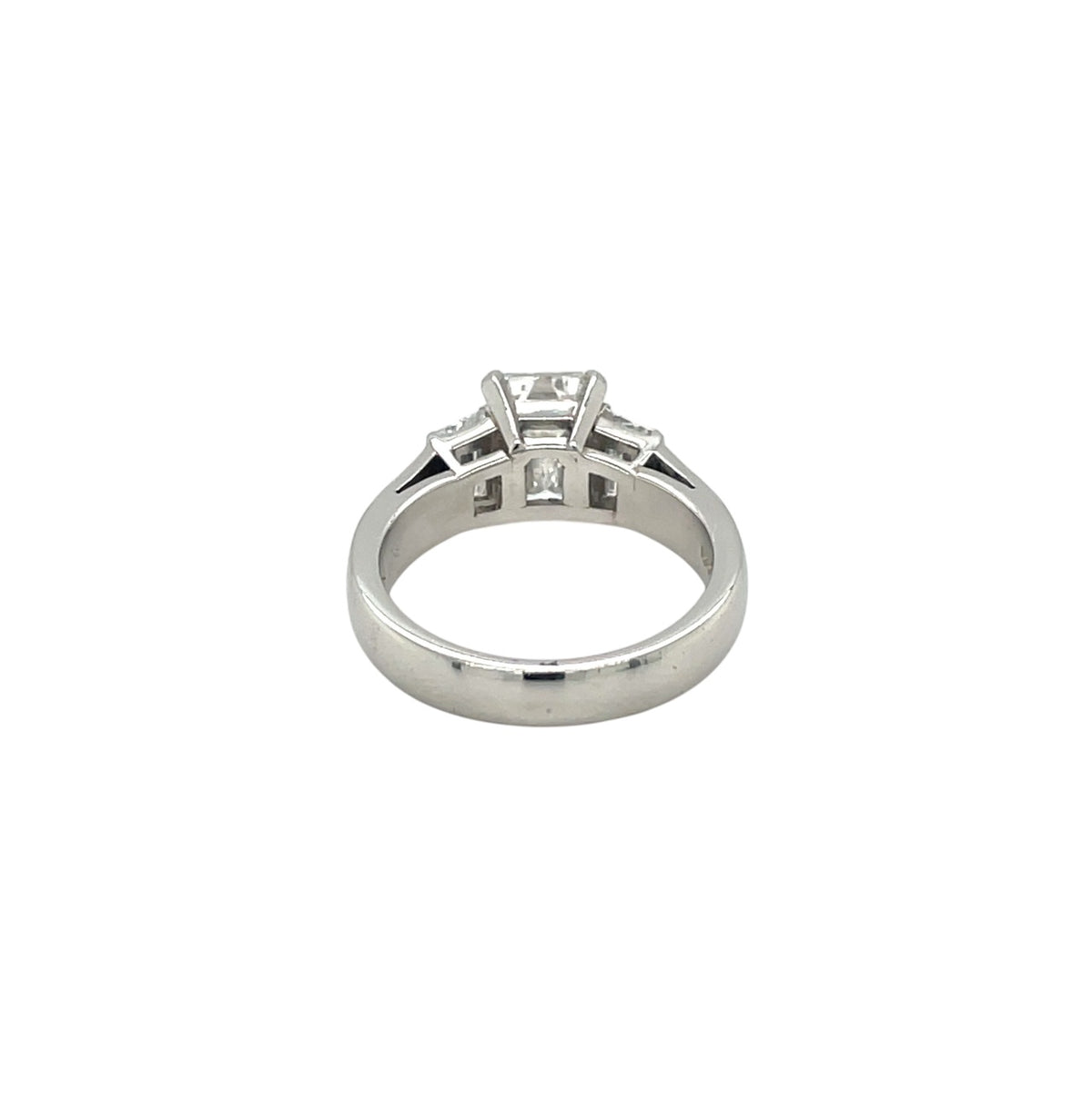Platinum Emerald-Cut Diamond Three Stone Ring (K)