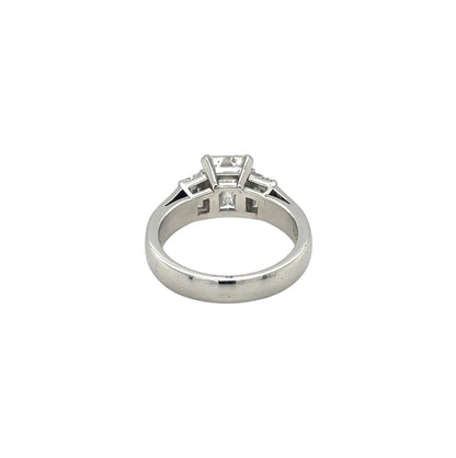 Platinum Emerald-Cut Diamond Three Stone Ring (K)