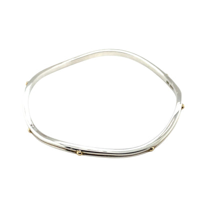 Silver Wavy Bangle With Gold Dots