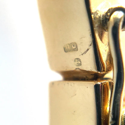 18ct yellow gold hinged bangle with 11 flush set diamonds and a figure of 8 safety catch