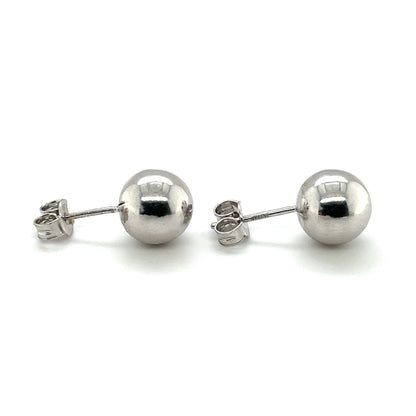 An elegant pair of 'echo' oval drop earrings, crafted in silver. These drop earrings are secured with a post and butterfly scroll back for a comfortable wearing experience.