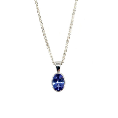 9ct White Gold Oval Tanzanite Rubover Pendant (7x5mm)