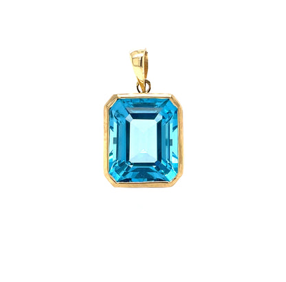 9ct Yellow Gold Octagonal Swiss Blue Topaz Rubover Pendant
