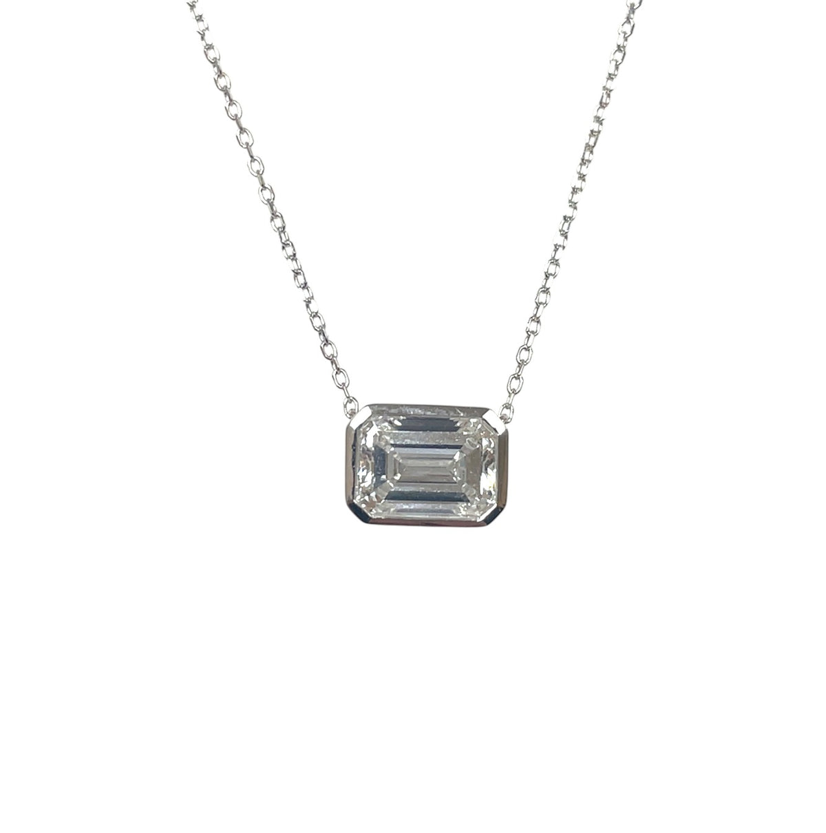 18ct White Gold Emerald Cut Diamond Pendant & Chain (18")