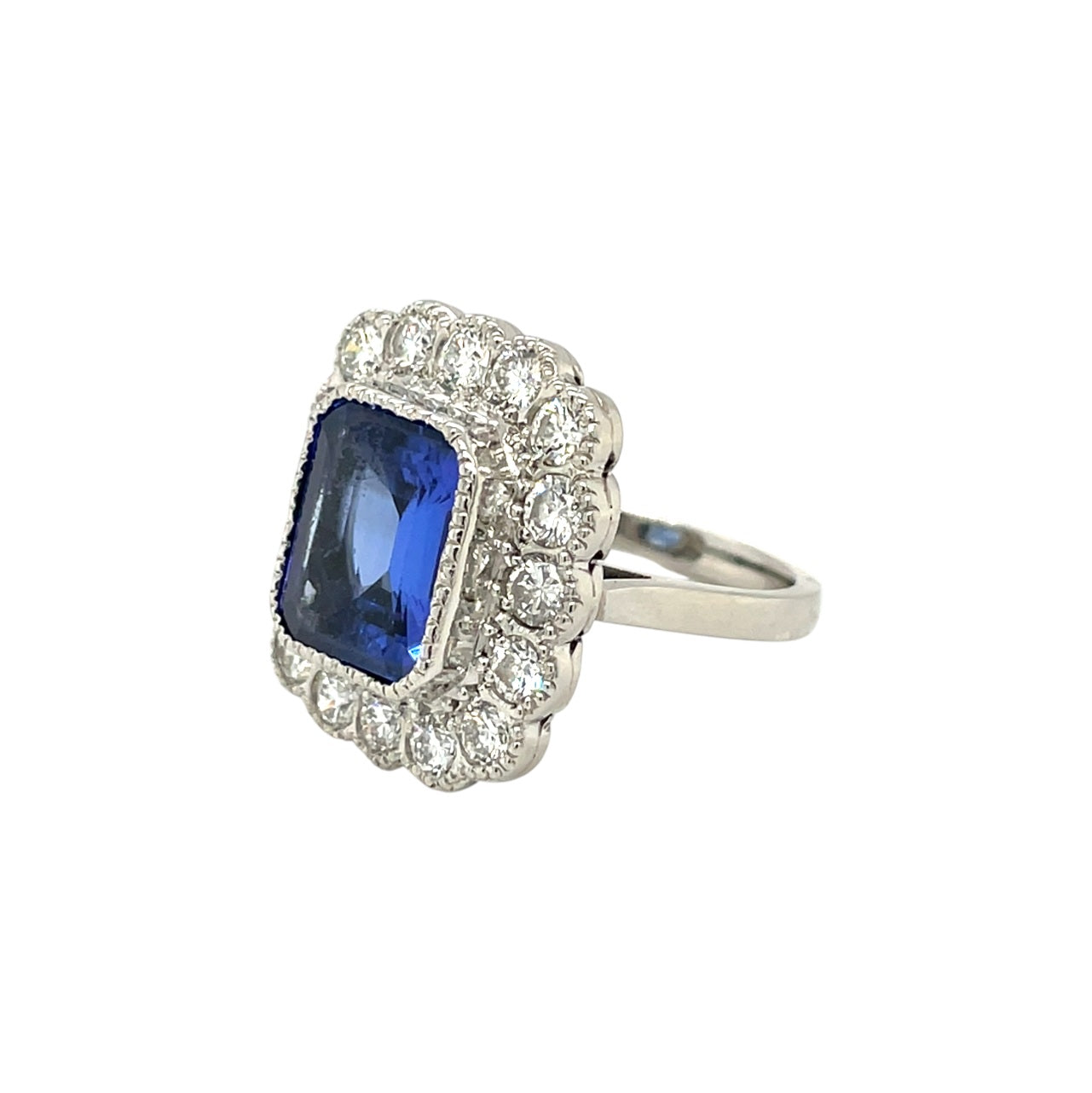 Platinum Tanzanite & Diamond Halo Ring (L)