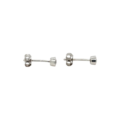 18ct White Gold Rubover Diamond Stud Earrings